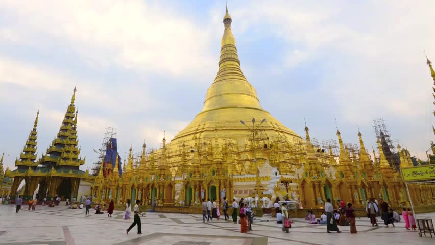 YANGON, MYANMAR- November 20 : People visit the Shwedagon Pagoda on November 20, 2012. Shwedagon Pagoda is the most sacred Buddhist pagoda for the Burmese.