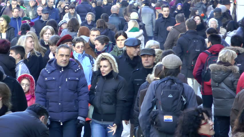 STUTTGART, GERMANY - DECEMBER 1: (Slow Motion) A crowd of people walking in the Stuttgart Christmas Market on December 1, 2012 in Stuttgart, Germany.  The Stuttgart Christmas Market is one of the largest in Europe.