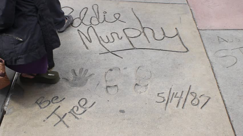 HOLLYWOOD, CA - CIRCA 2011: Eddie Murphy's hand and footprints at Grauman's Chinese Theater on Hollywood Boulevard in Hollywood, California.