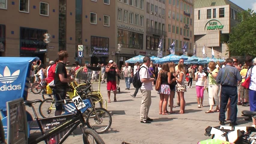 MUNICH, GERMANY - CIRCA 2011: German bicycle taxis in Munich's Marienplatz.