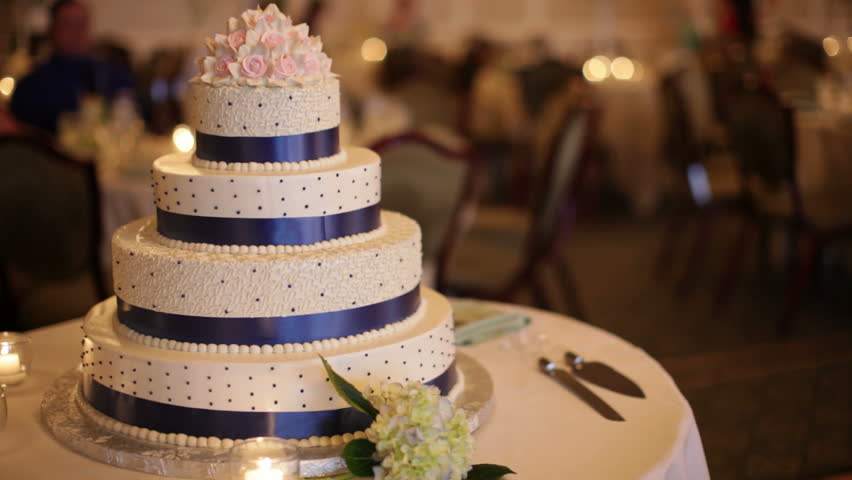 A blue banded wedding cake