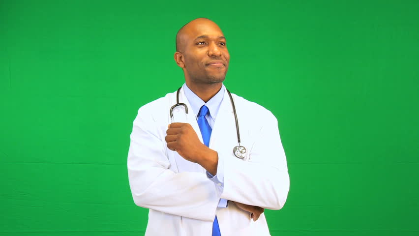 Male African American doctor hand gestures green screen chroma keying