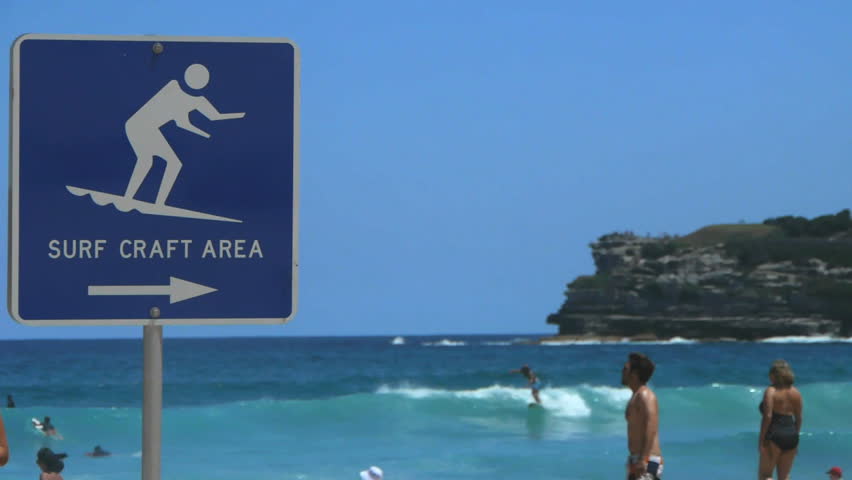 SYDNEY, AUSTRALIA - JAN 3: A surfer rides a wave at Bondi Beach in Sydney, Australia on January 3, 2013.