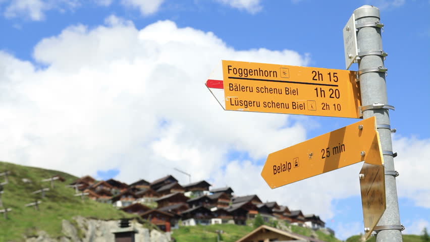 Yellow signboard for hikers in Belalp, Switzerland.
Fast motion 1080p 60fps so you can decrease speed.
25 sec.