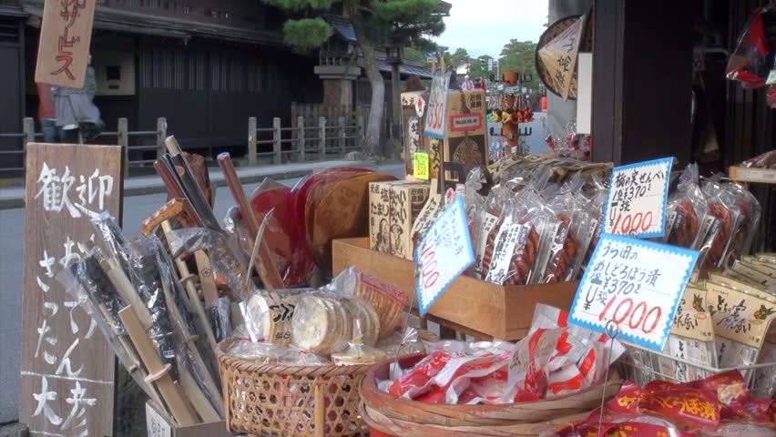 TAKAYAMA, JAPAN - 19 OCTOBER 2012: Souvenirs for sale at a roadside shop in Takayama, Japan