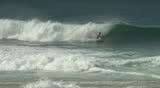 Surfer Conquers Breaking Wave, 240 fps slow motion