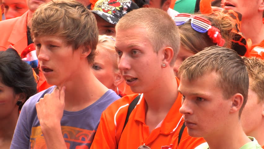 GRONINGEN, HOLLAND - JULY 11: Dutch soccer fans supporting their team during the final of the FIFA World Cup 2010 Netherlands vs. Spain - July 11, 2010 in Groningen, the Netherlands.
