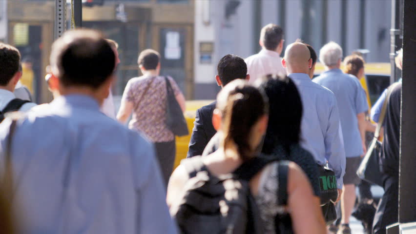 New York - August 21, 2012: City streets full of commuters starting their working day 