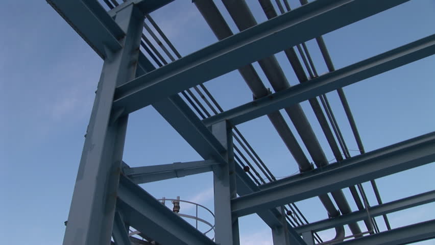 Underground storage of natural gas. Factory distribution, and industrial processing of natural gas with Worker. Many pipelines and construction. 