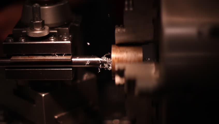 Machining metal rod with metal lathe