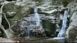 Waterfall in the river valley Syk
