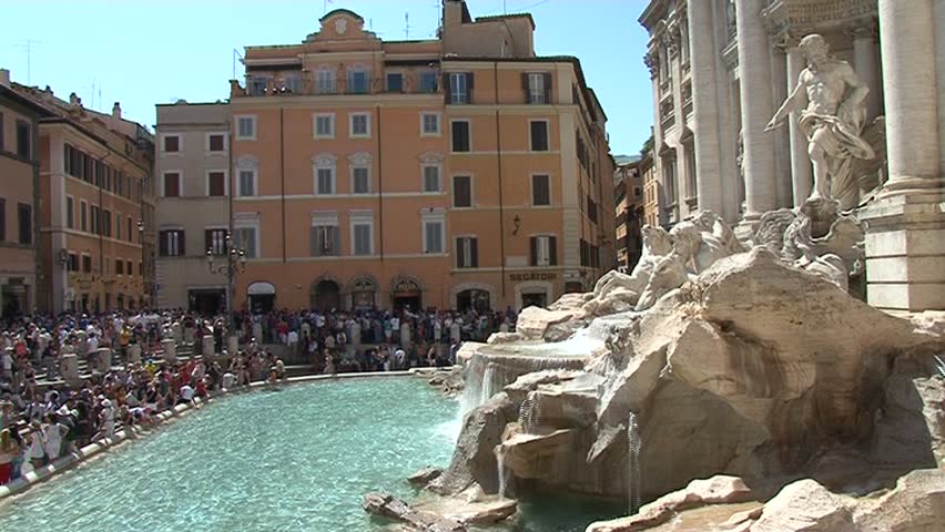 ROME - SEPT 04: Tourists in front of Fontana di Trevi on September 04, 2011 in Rome, Italy. Due to crisis Roman tourism is facing hard times dropping by more than 5% in comparison to 2008.
