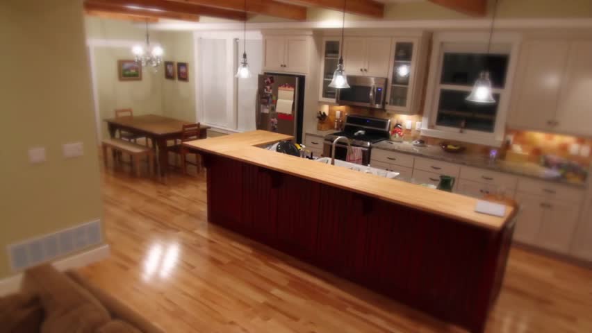 The interior kitchen and dining room of a beautiful country home.