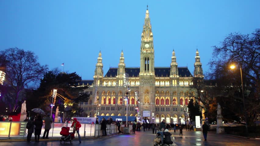 VIENNA- FEB 19: people on an ice skating rink near City Hall, Feb 19, 2011, Vienna, Austria. Visitors can plunge into fantastic atmosphere, riding under music, and in evening - admiring illumination.