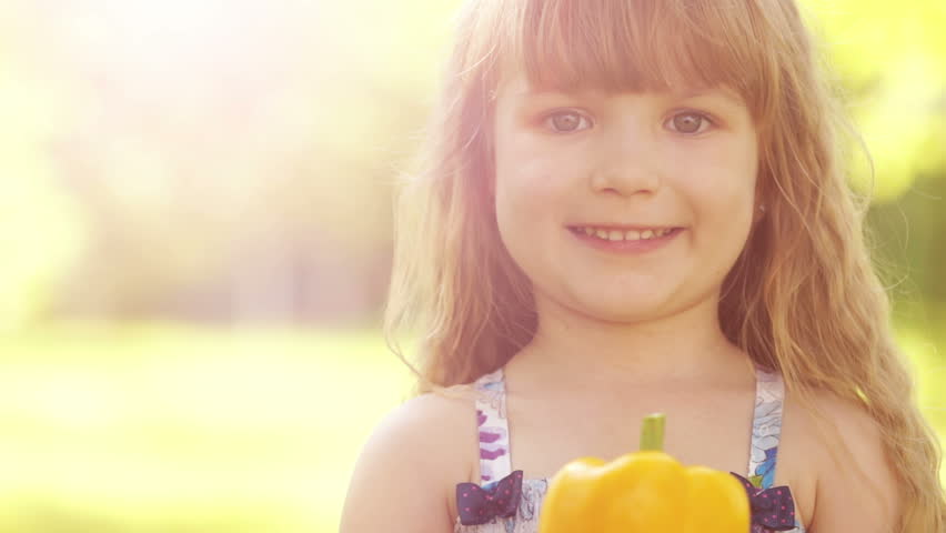 Sunny mashroom girl. Child with a basket of mushrooms. Thumbs up. Ok.