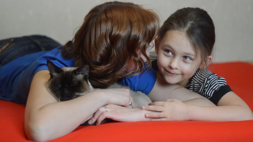 Mother and daughter tell each other funny stories