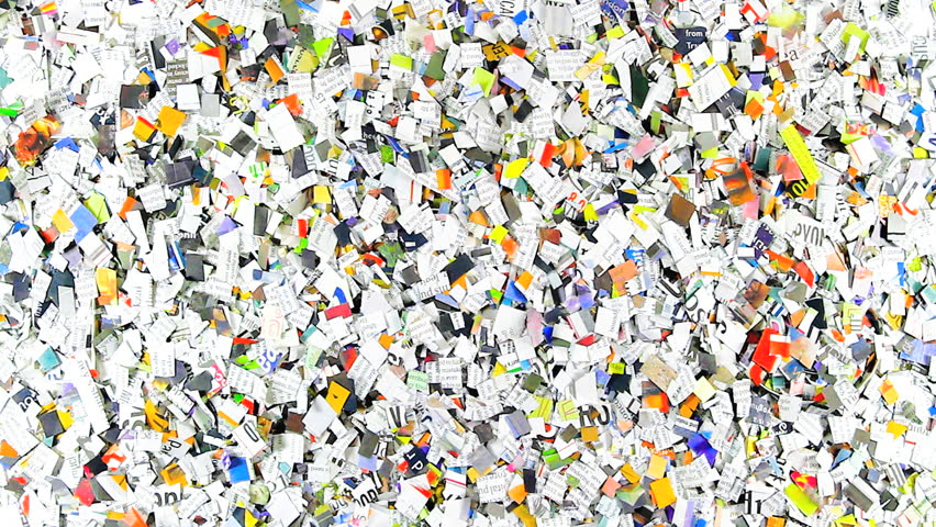 chopped up newspaper forming the word NEWS