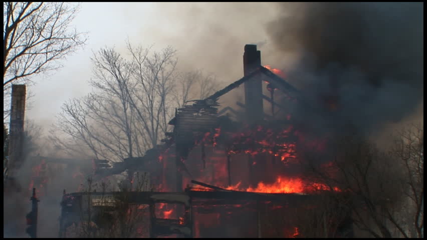 A home is completely destroyed by fire.