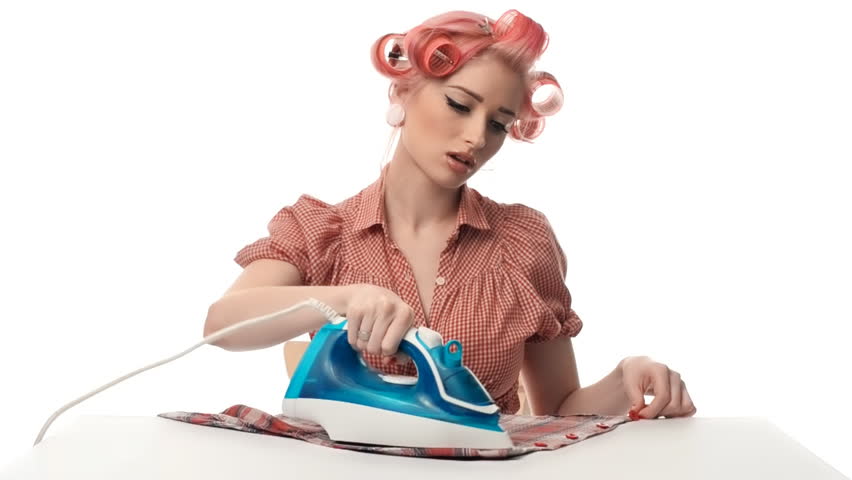 beautiful portrait of pin-up girls housewife with iron