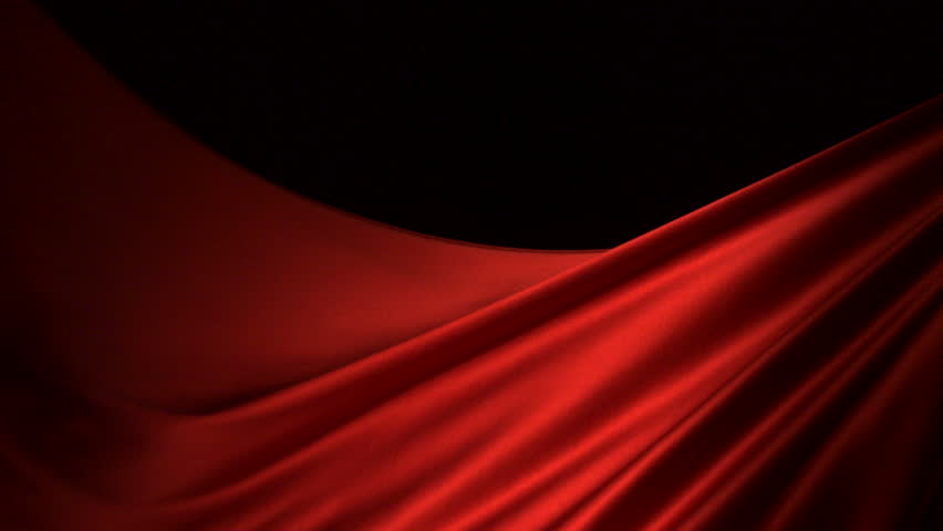Red silk fabric flying in the air shooting with a high speed camera.