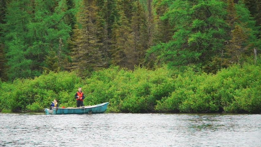 Couple fishing on a northern lake.