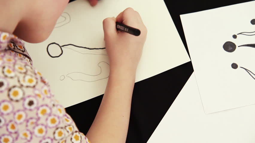 Kid writes question marks thinking about future