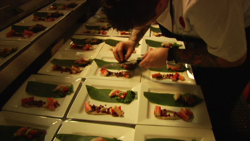 sushi chef makes large quantities
