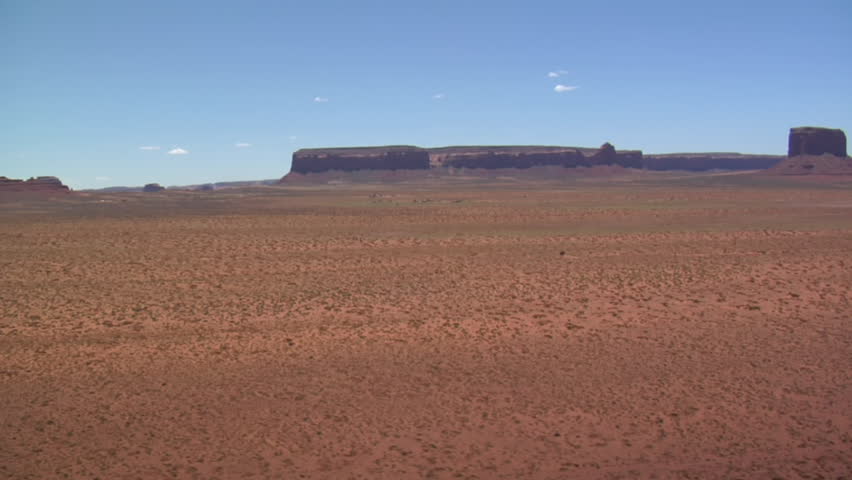 red rock desert with distant buttes
