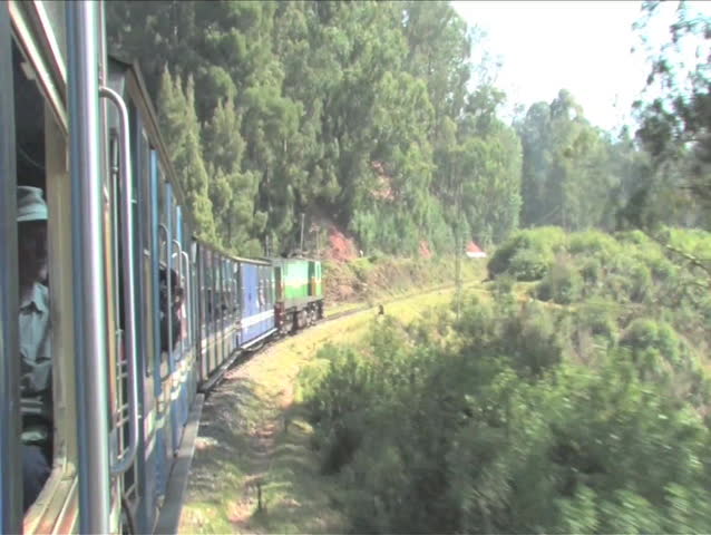 Ride the famous heritage stream train of India from Ooty to Coonoor through the narrow gauge Nilgiri Blue Mountains.