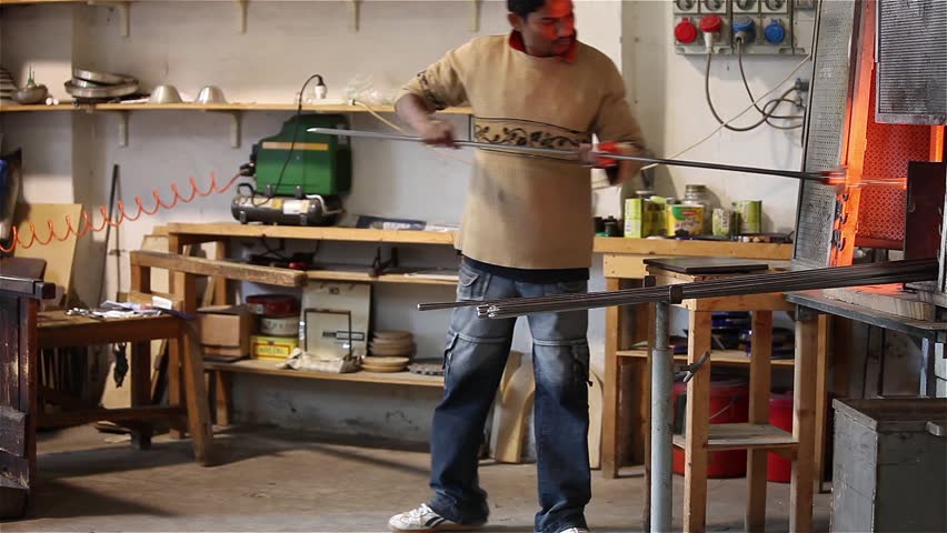 Artisan Of Glass In Murano - Video clip of artisan of glass creating a crystal vase - Murano, Venice, Italy.