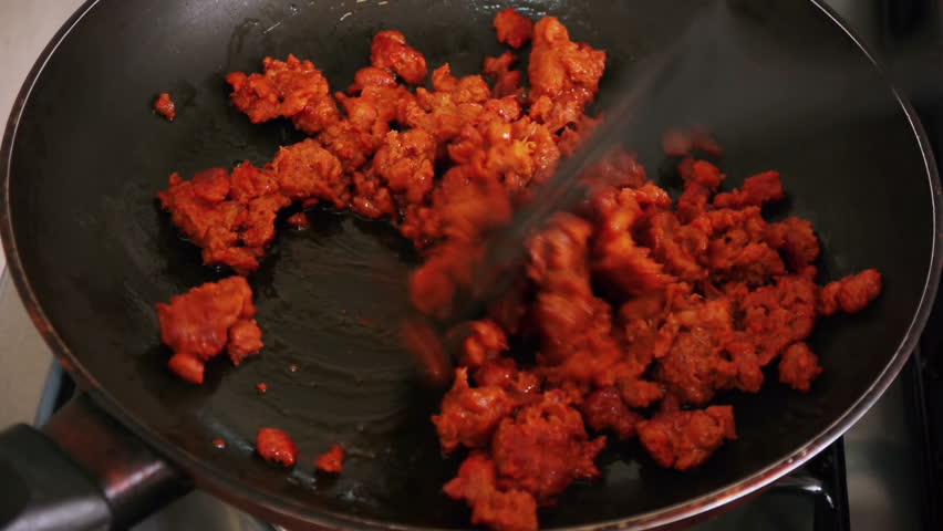 Preparing Mexican Chorizo Red. A type of pork spicy sausage.