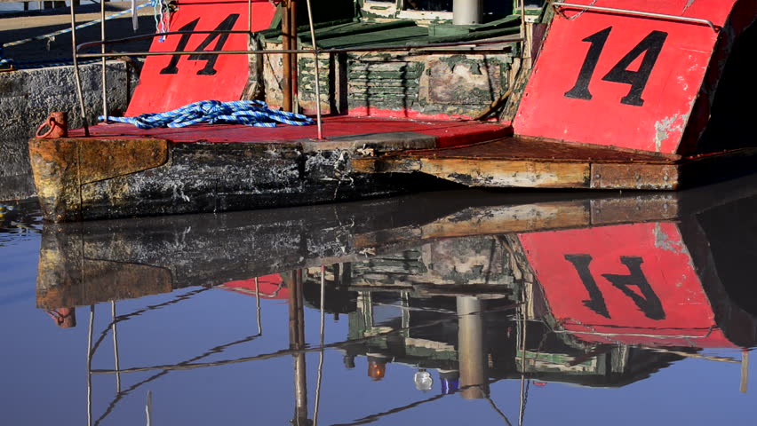 Old boat reflex at sea salt marsh, Salt industry. Torrevieja. Alicante. Spain