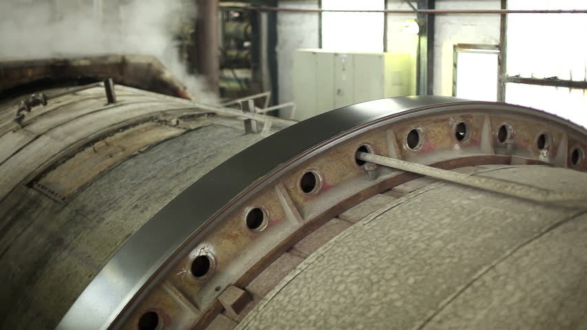 Steam in industrial plants, inside the factory for sugar production. Processing Sugar Beet in Sugar Refinery.