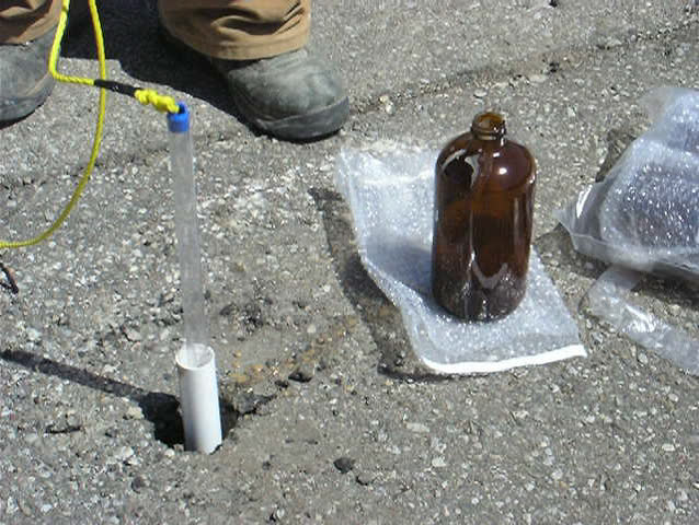 Underground water.  Collecting underground water samples from drilled special prepared assessment point. The water will be used for lab analyses. 