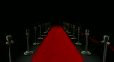 The popular red carpet and velvet ropes scene at award shows, celebrations, premieres, etc is here on a black background like it is night time.  The video is seamlessly looped and has a luma channel.