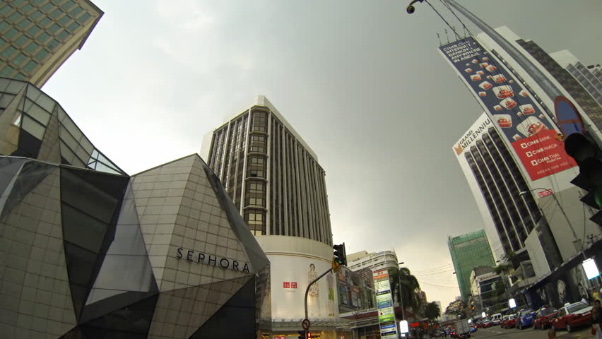 KUALA Lumpur, 21 March:  Time lapse vertical pan of the traffic on Jalan Bukit Bintang in Kuala Lumpur Malaysia on 21 March 2013