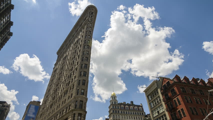 NEW YORK - AUGUST 16, 2012: Flatiron Building on August 16, 2012 in New York. Flatiron Building, located at 175 Fifth Avenue in the borough of Manhattan, is considered a groundbreaking skyscraper.