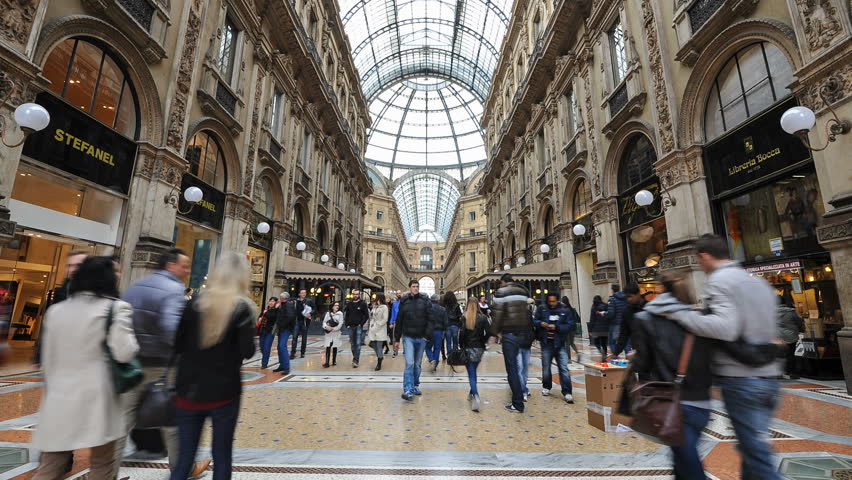 MILAN, ITALY - MARCH 23: (Timelapse View) People Shopping in Vittorio Emanuele II Gallery on March 23, 2013 in Milan. The Gallery is the oldest shopping mall in Italy, built between 1865 and 1877.