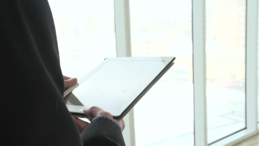 Business man on his tablet