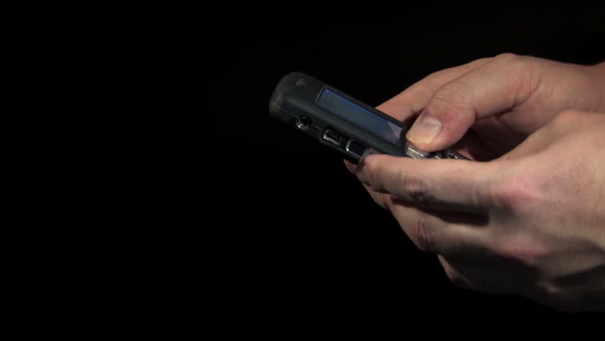 Text messaging on a smartphone device.  For editorial use only.