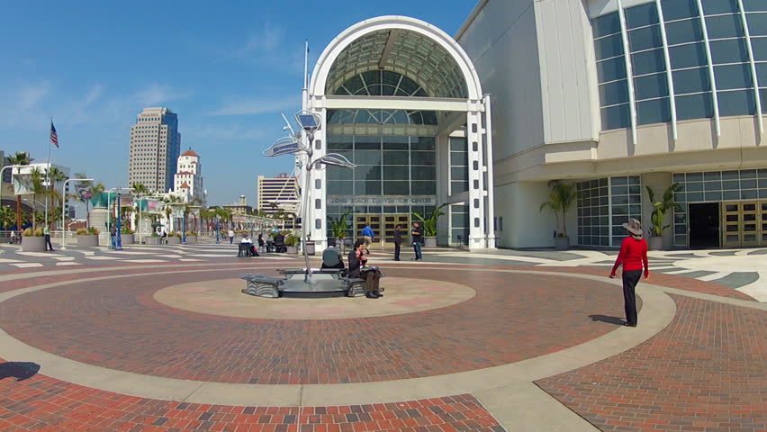 LONG BEACH, CA - APRIL 2, 2013: The Long Beach Convention Center with people milling on the entrance plaza circa 2013 in Long Beach. Long Beach is a major destination for conventions and tourists.
