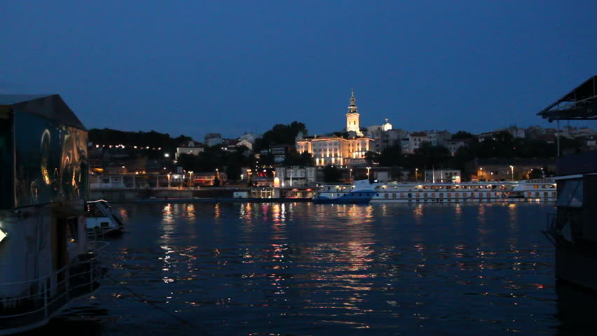 Belgrade, Serbia - capital city view at night. Illuminated cityscape.