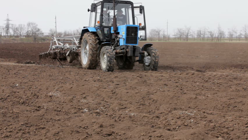 Tractor working on the filed.