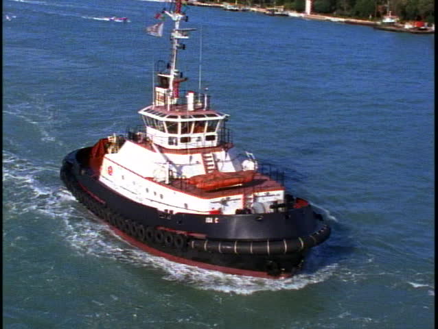 Tug boat follow, churning water