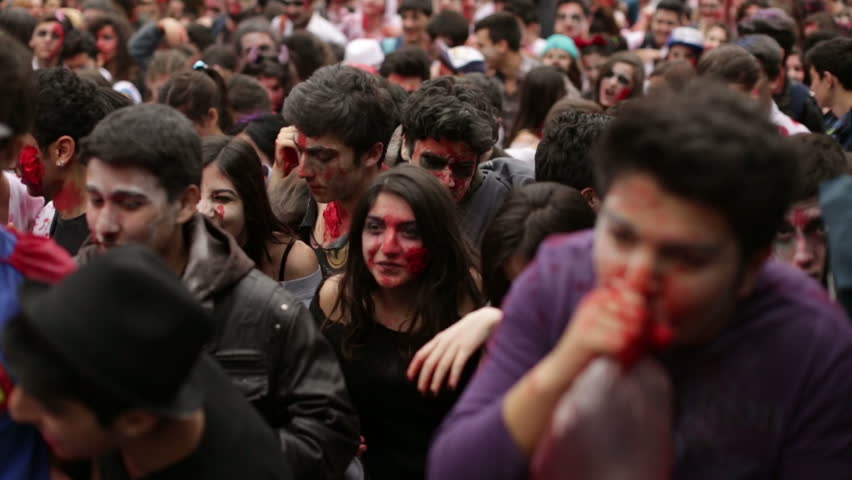 ISTANBUL - APRIL 7: People dressed as zombies walking on the street during Zombie Walking Dead event in Istanbul, Turkey on April 7, 2013.