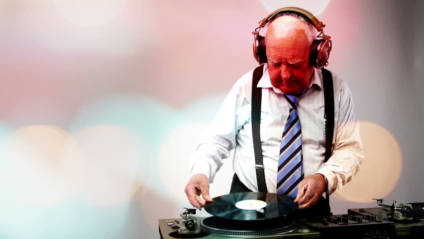 a very funky elderly grandpa dj mixing records
