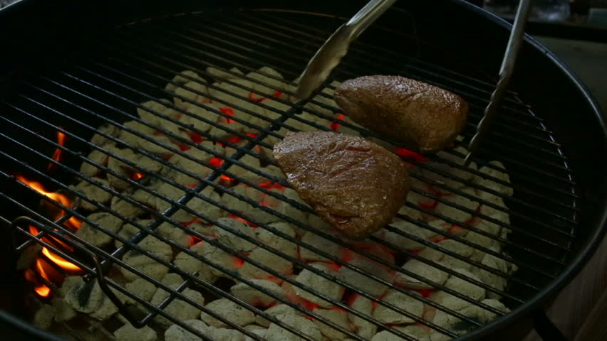 Flipping sirloin steak