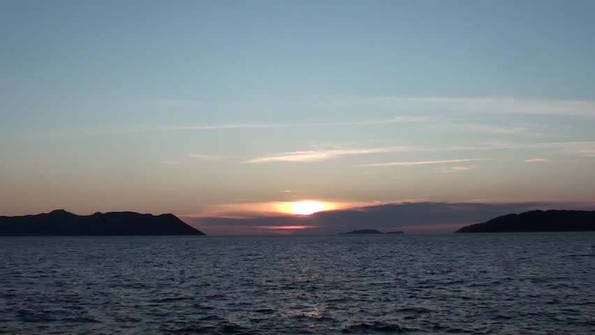 Sunset, sea, ripples waves, clouds, islands, waves sound
