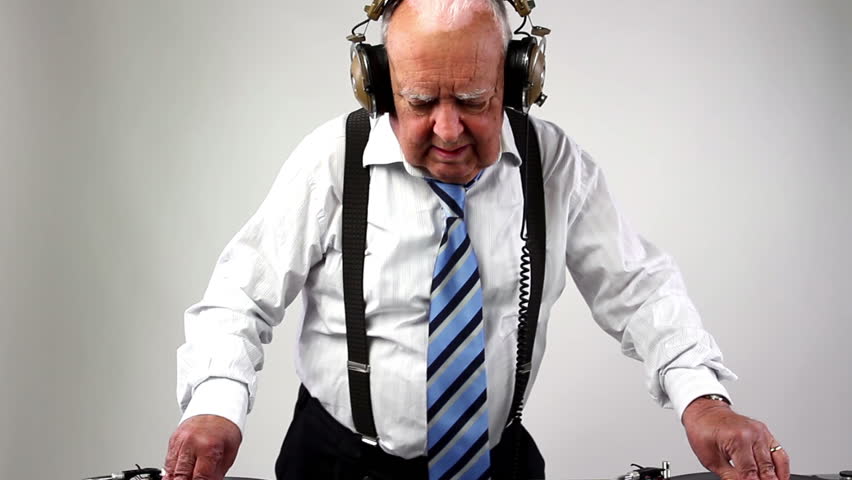 a very funky elderly grandpa dj mixing records
