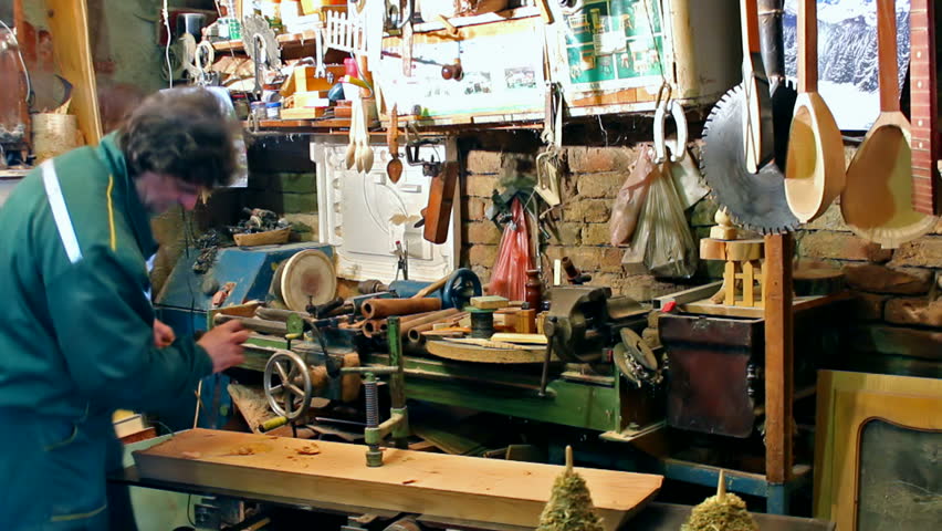 carpenter processing timber in his carpentry workshop,video clip;Wood workshop 